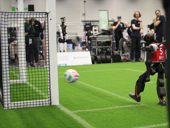 Hard Kick into the Goal